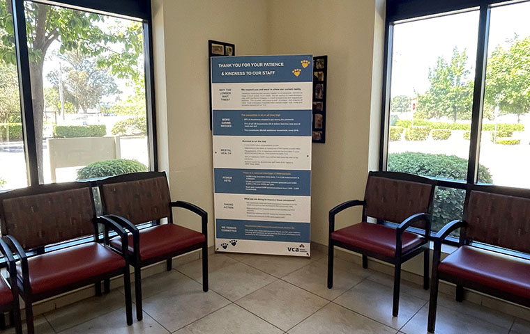 Large sign is displayed in veterinary hospital lobby