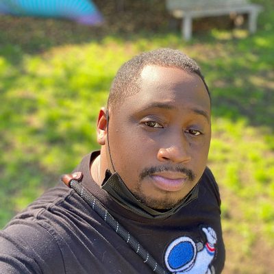 advi-d-randolph Selfie of Donnell wearing a black shirt with an astronaut on it.